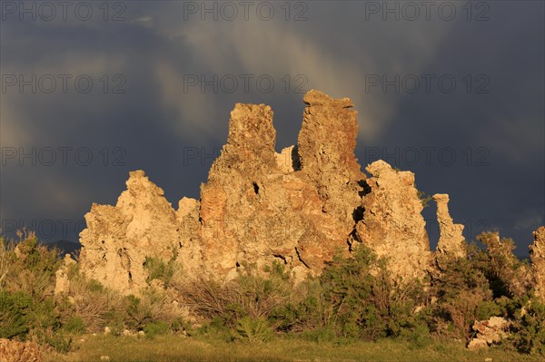Dramatic rock formations against a cloudy sky at dusk, Mono Lake, North America, USA, South-West, California, California, North America