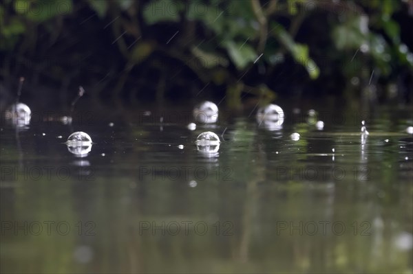 April weather, rain meets a lake, Germany, Europe