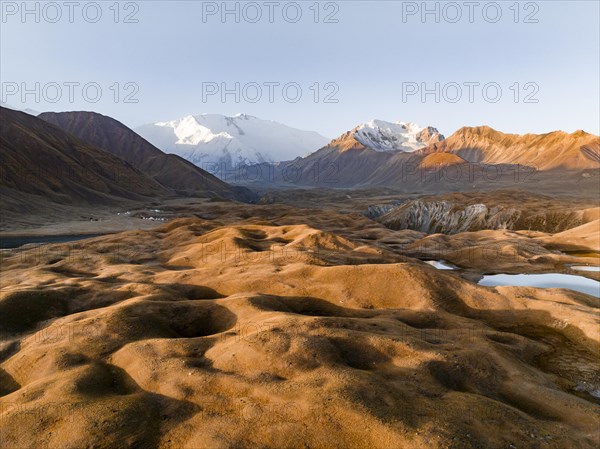 Aerial view, high mountain landscape with glacial moraines and mountain lakes, behind Pik Lenin, Trans Alay Mountains, Pamir Mountains, Osher Province, Kyrgyzstan, Asia