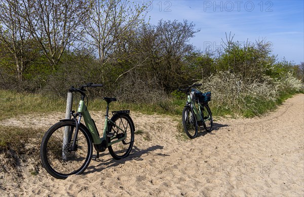 E-bikes on the beach at Alt-Reddevitz, Ruegen, Mecklenburg-Western Pomerania, Germany, Europe
