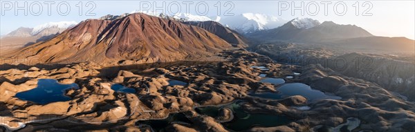 Aerial view, high mountain landscape with glacial moraines and mountain lakes, behind Pik Lenin, Trans Alay Mountains, Pamir Mountains, Osher Province, Kyrgyzstan, Asia