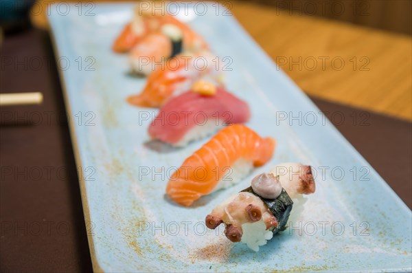 Combined of differents premium japanese sushi (niguiri) on an elegant plate