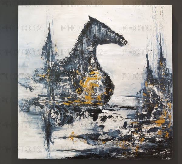 Decorative acrylic painting of mystic horse and castle by Liza Castro on dark living room wall inside contemporary home, Quebec, Canada. Artwork by Liza Castro