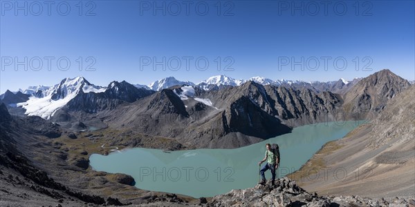 Panorama, mountaineers on the way to the Ala Kul Pass, view of mountains and glaciers and turquoise Ala Kul mountain lake, Tien Shan Mountains, Kyrgyzstan, Asia