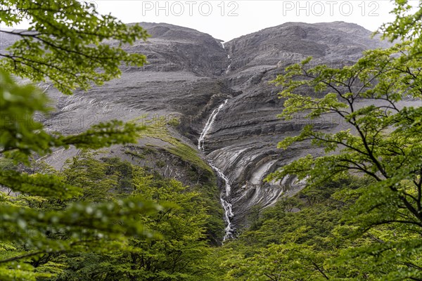 Meltwater waterfall, Base of Torres del Paine Hike, Torres de Paine, Magallanes and Chilean Antarctica, Chile, South America