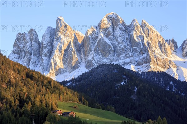 Rocky mountain peaks in the warm light of the setting sun, Italy, Trentino-Alto Adige, Alto Adige, Bolzano province, Dolomites, Santa Magdalena, St. Maddalena, Funes Valley, Odle, Puez-Geisler Nature Park in autumn, Europe