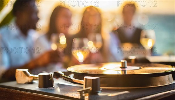 Friends enjoy drinks vinyl record playing together in cozy setting at sunset, bokeh effect ai generated, AI generated