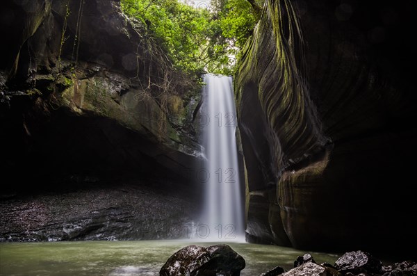 Beautiful waterfall in long exposure photography, known as the waterfall of the swallows, located in Rolante in Brazil. Location for trekking and camping