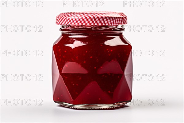 Jar with red jam or marmelade on white background. KI generiert, generiert, AI generated