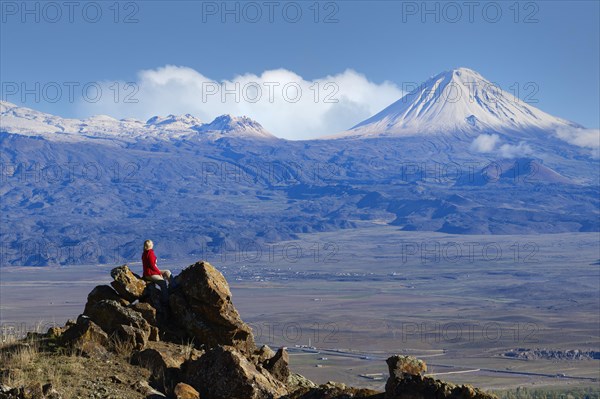 Woman looking to snowcapped Mount Ararat, Dogubayazit, Turkey, Asia