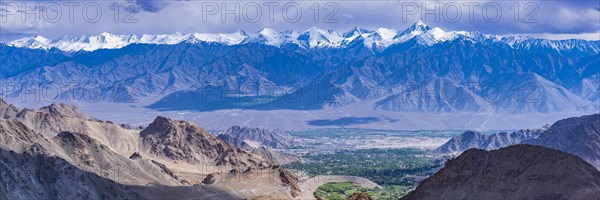 Panorama from the Khardong Pass, the second highest motorway pass in the world, over Leh and the Indus Valley to Stok Kangri, 6153m, Ladakh, Jammu and Kashmir, India, Asia