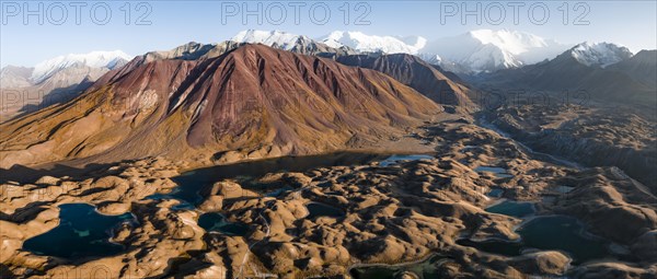 Aerial view, high mountain landscape with glacial moraines and mountain lakes, behind Pik Lenin, Trans Alay Mountains, Pamir Mountains, Osher Province, Kyrgyzstan, Asia