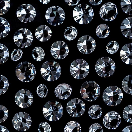 Seamless pattern of sparkling diamonds on a black background AI generated