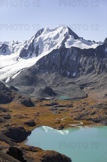 Dramatic landscape, Tien Shan high mountains, mountain lake Ala-Kul Lake, 4000 metre peaks with glacier, Ak-Su, Kyrgyzstan, Asia