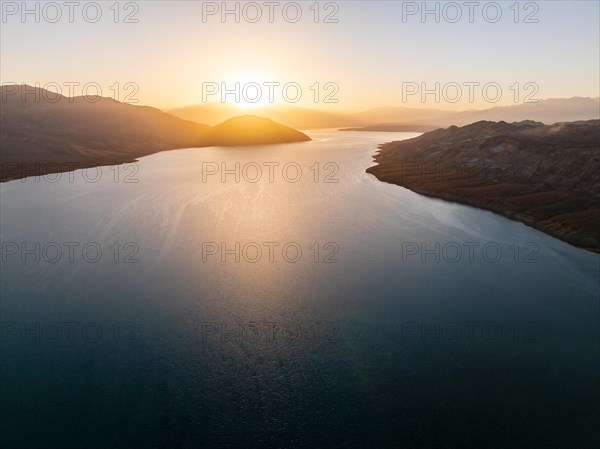 Sunset over the Toktogul reservoir at sunset, aerial view, Kyrgyzstan, Asia