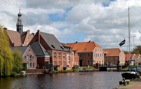 Falderndelft, view towards the bascule bridge Friedrich-Ebert-Strasse, upper left tower of the New Church, Emden, East Frisia, Lower Saxony, Germany, Europe