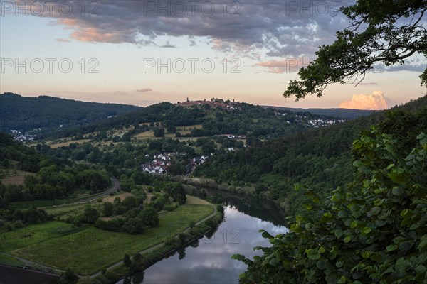 Landscape in the Little Odenwald, view of the village of Dilsberg and the Dilsberg castle fortress as well as the village of Rainbach and the Neckar river. Forests and fields. View from the Bockfelsenhuette. In the evening at sunset in summer. Neckargemuend, Baden-Wuerttemberg, Germany, Europe