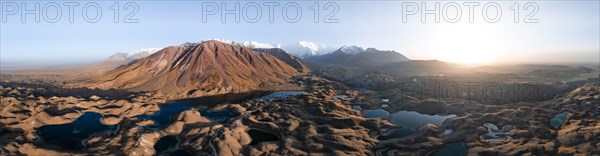 Atmospheric aerial view, high mountain landscape with glacier moraines and mountain lakes, behind Pik Lenin, Trans Alay Mountains, Pamir Mountains, Osher Province, Kyrgyzstan, Asia