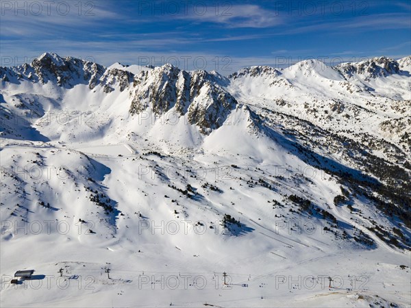 View of ski slopes in an alpine resort with snow-covered slopes, Grau Roig, Encamp, Andorra, Pyrenees, Europe