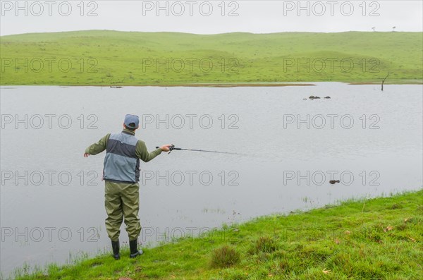Black bass fisherman fishing, Cambara do sul, Rio Grande do sul, Brazil, South America