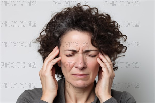 Portrait of middle-aged woman with migraine or headache. KI generiert, generiert, AI generated