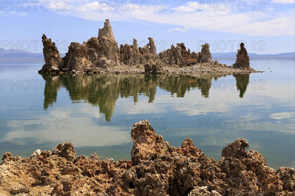 Peaceful scene with limestone rocks reflected in the clear water surface, Mono Lake, North America, USA, South-West, California, California, North America