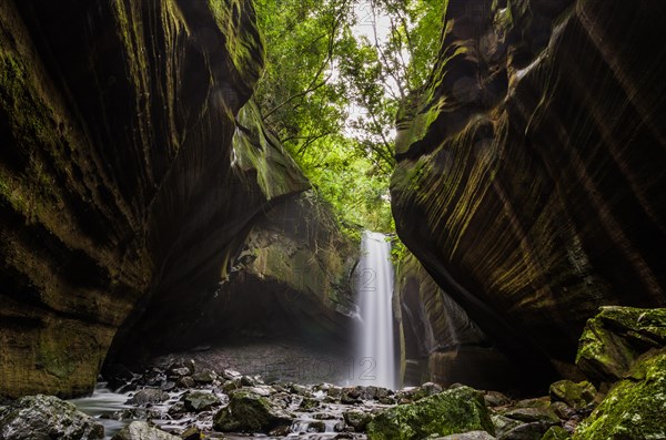 Beautiful waterfall in long exposure photography, known as the waterfall of the swallows, located in Rolante in Brazil. Location for trekking and camping