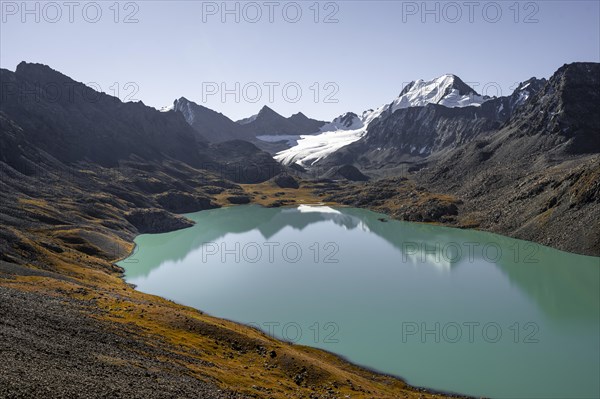 Dramatic landscape, Tien Shan high mountains, mountain lake Ala-Kul Lake, 4000 metre peaks with glacier, Ak-Su, Kyrgyzstan, Asia
