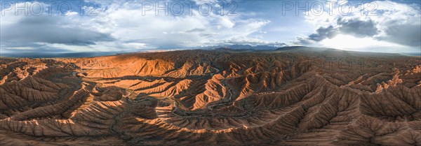 Aerial view, Panorama, Canyon runs through landscape, Issyk Kul Lake, Dramatic barren landscape of eroded hills, Badlands, Canyon of the Forgotten Rivers, Issyk Kul, Kyrgyzstan, Asia