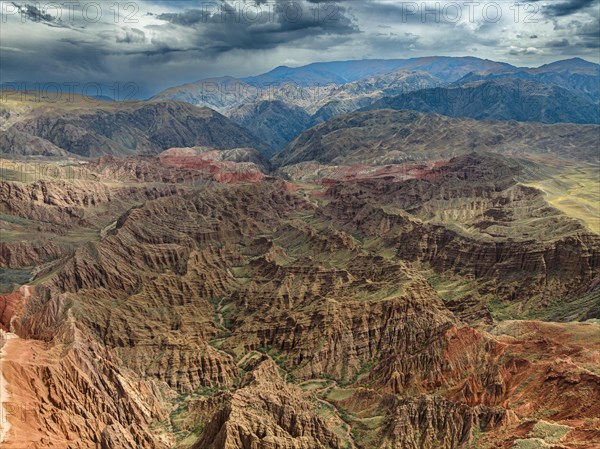 Badlands, gorges and mountains, eroded red sandstone cliffs, Konorchek Canyon, Boom Gorge, aerial view, Kyrgyzstan, Asia