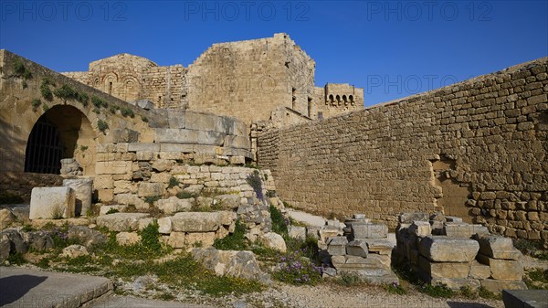 Ancient ruins with an arch and a clear view of the blue sky, St John's Fortress, Lindos, Rhodes, Dodecanese, Greek Islands, Greece, Europe