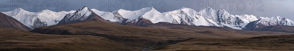 Panorama, Glaciated and snow-capped mountains, dramatic landscape, autumnal mountain landscape with yellow grass, Tian Shan, Sky Mountains, Sary Jaz Valley, Kyrgyzstan, Asia