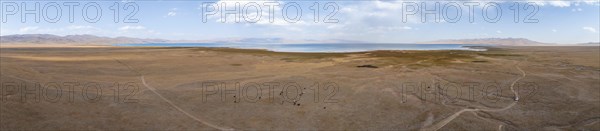 Aerial view, Vast empty landscape at the mountain lake Song Kul in autumn, Moldo Too Mountains, Naryn region, Kyrgyzstan, Asia