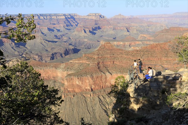 Tourists at a viewpoint of the Grand Canyon with a view of the deep gorges, Grand Canyon National Park, South Rim, North America, USA, South-West, Arizona, North America