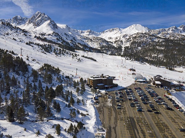 Aerial view of a car park at a ski resort with mountain scenery in the background, Grau Roig, Encamp, Andorra, Pyrenees, Europe