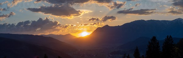 Sunset over the Liesingtal, in the evening light the village Kraubath, Schoberpass federal road, panoramic view, view from the lowlands, Leoben, Styria, Austria, Europe