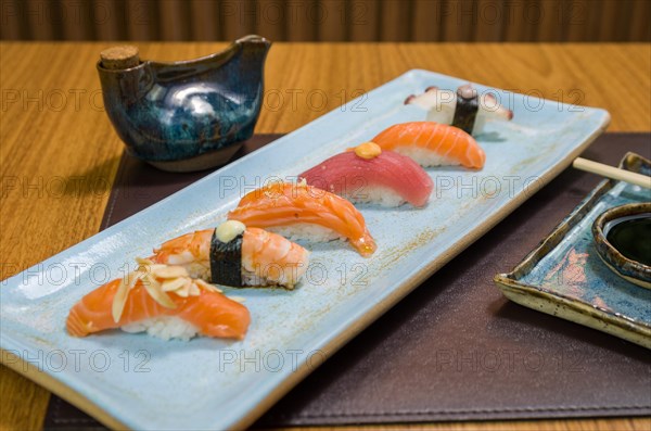 Combined of differents premium japanese sushi (niguiri) on an elegant plate