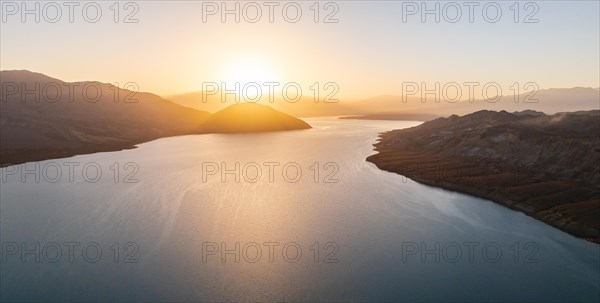 Sunset over the Toktogul reservoir at sunset, aerial view, Kyrgyzstan, Asia