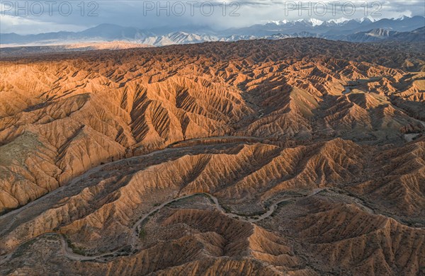 Evening atmosphere, Mountain peaks of the Tien Shan Mountains, Dramatic barren landscape of eroded hills, Badlands, Canyon of the Forgotten Rivers, Issyk Kul, Kyrgyzstan, Asia