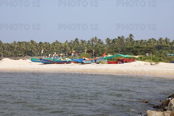 Colourful fishing boats on Marari Beach, Mararikulam, Alappuzha district, Kerala, India, Asia
