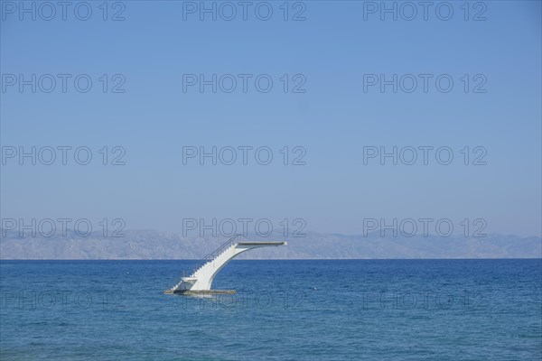 Free-standing diving tower in the sea, Rhodes, Dodecanese archipelago, Greek islands, Greece, Europe