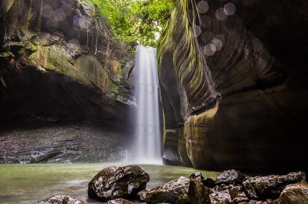 Beautiful waterfall in long exposure photography, known as the waterfall of the swallows, located in Rolante in Brazil. Location for trekking and camping