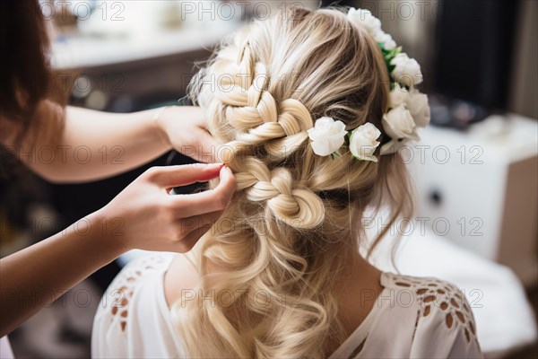 Hairdresser styling beautiful bridal hairstyle with white flowers. KI generiert, generiert, AI generated