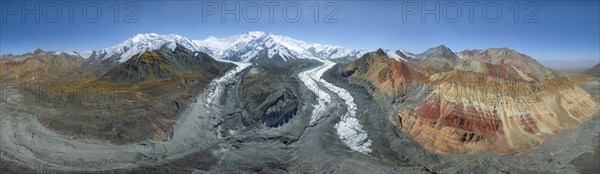 Aerial view, panorama, high mountain landscape with glacier moraines and glacier tongues, glaciated and snow-covered mountain peaks, Lenin Peak and Peak of the XIX Party Congress of the CPSU, Traveller's Pass, Trans Alay Mountains, Pamir Mountains, Osher Province, Kyrgyzstan, Asia