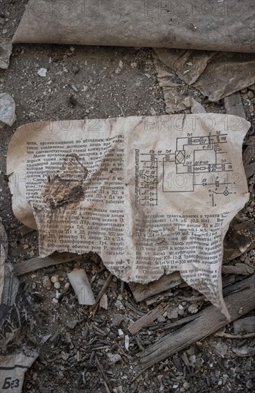 Old newspaper and objects from the USSR, Abandoned ruins, ghost town Enilchek in the Tien Shan Mountains, Ak-Su, Kyrgyzstan, Asia