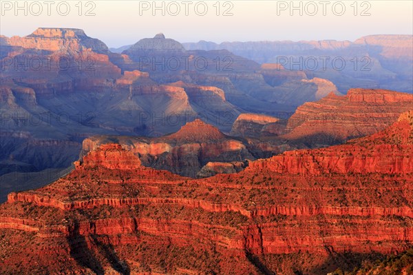 The Grand Canyon presents itself in red and purple colours at dusk, Grand Canyon National Park, South Rim, North America, USA, South-West, Arizona, North America