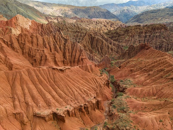 Badlands, canyon with eroded red sandstone rocks, Konorchek Canyon, Boom Gorge, aerial view, Kyrgyzstan, Asia