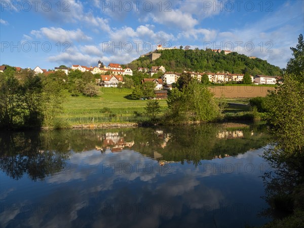 Reflection in a pond, Riegersburg in the morning light, Riegersburg, Styrian volcanic region, Styria, Austria, Europe