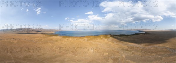 Aerial view, Vast empty landscape at the mountain lake Song Kul in autumn, Moldo Too Mountains, Naryn region, Kyrgyzstan, Asia