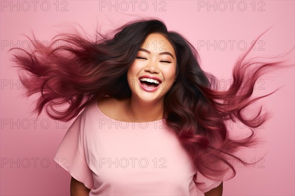 Smiling Asian plus size woman with long pink and black ombre hair. KI generiert, generiert, AI generated